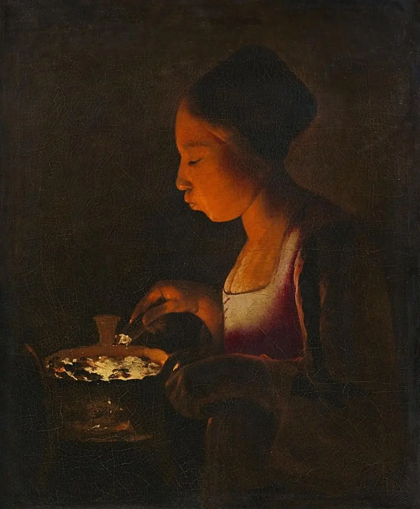 A Girl Blowing on a Brazier