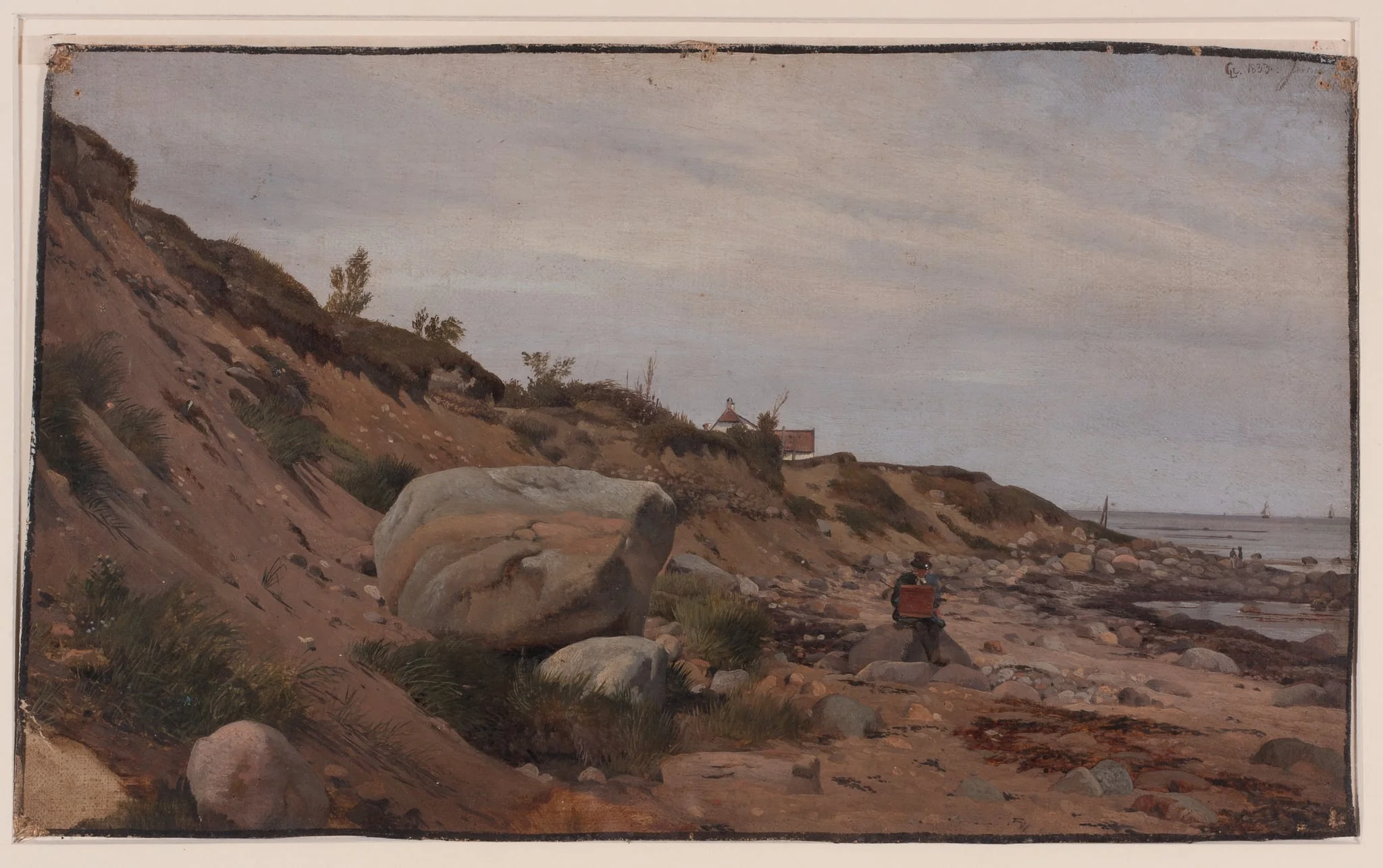 Maler in steinigen Sanddünen