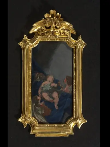 The Infant Christ asleep, adored by two angels