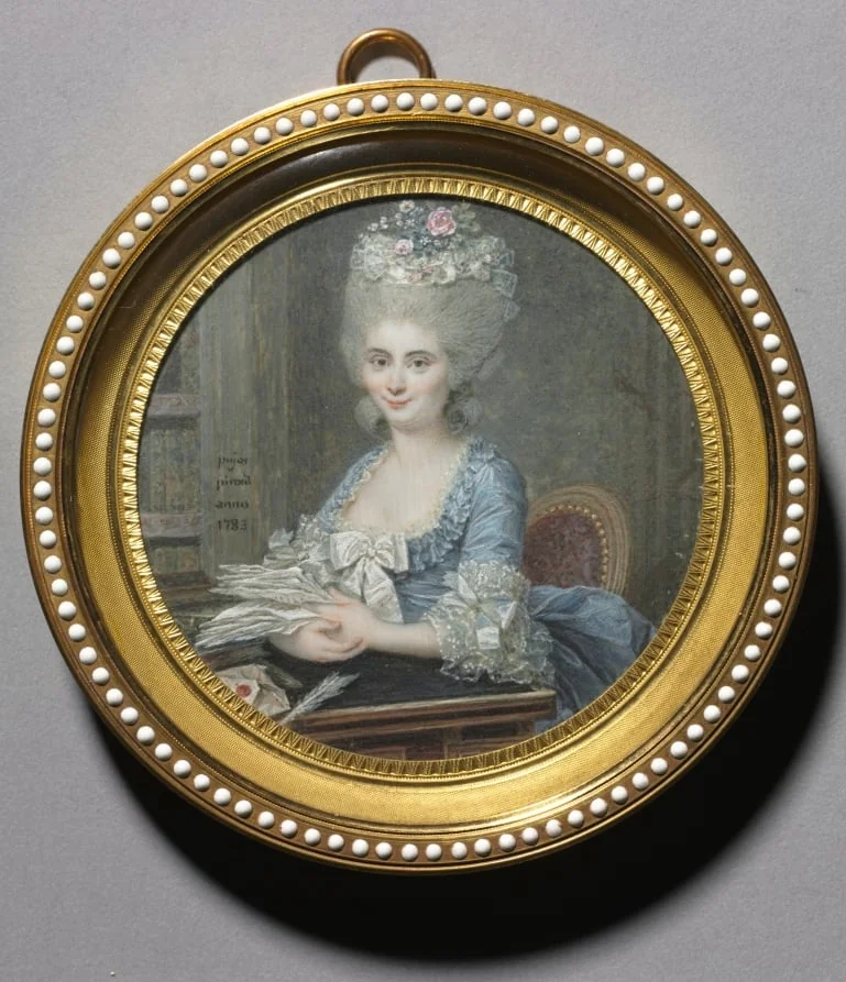 Portrait of a Woman in a Blue Dress