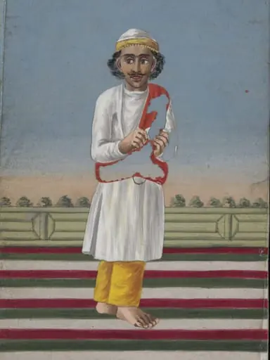 A Box covered and lined with brocade containing a card painted with a face, and with a verandah covered with a striped rug; also twelve mica overlays depicting dancers and musicians.