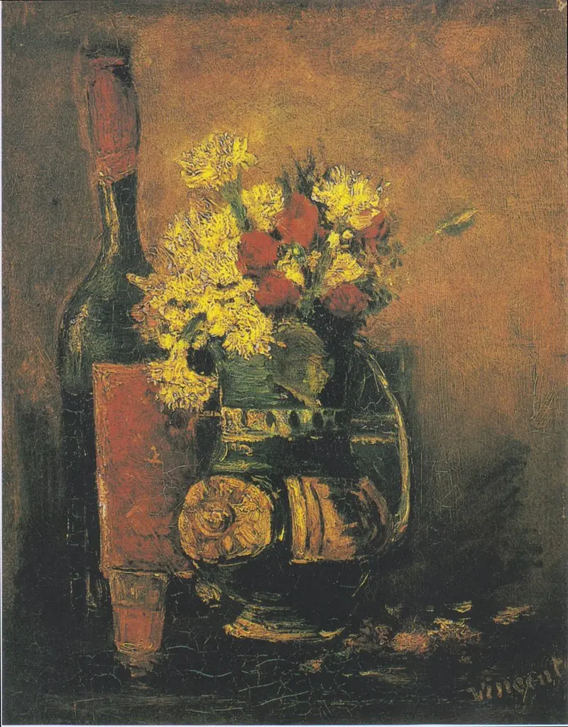 Vase of white carnations and roses and bottle