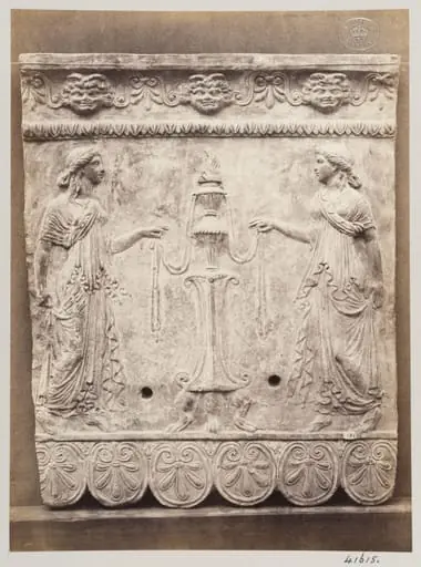 Bas-relief portion of a frieze of two draped females and an altar in terra cotta