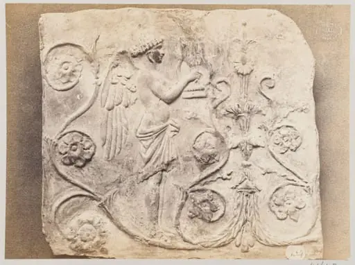 Bas-relief of a geni and a lyre in terra cotta