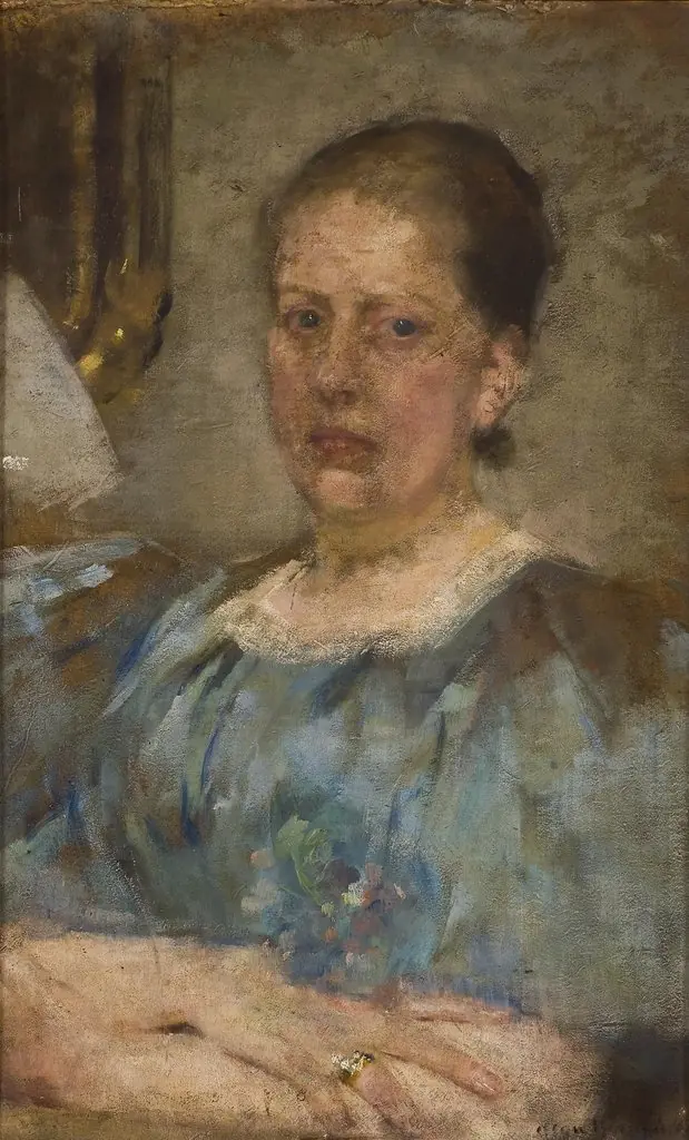 Portrait of a woman in a blue blouse