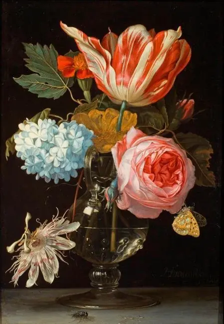 Flowers in a vase with a passion flower