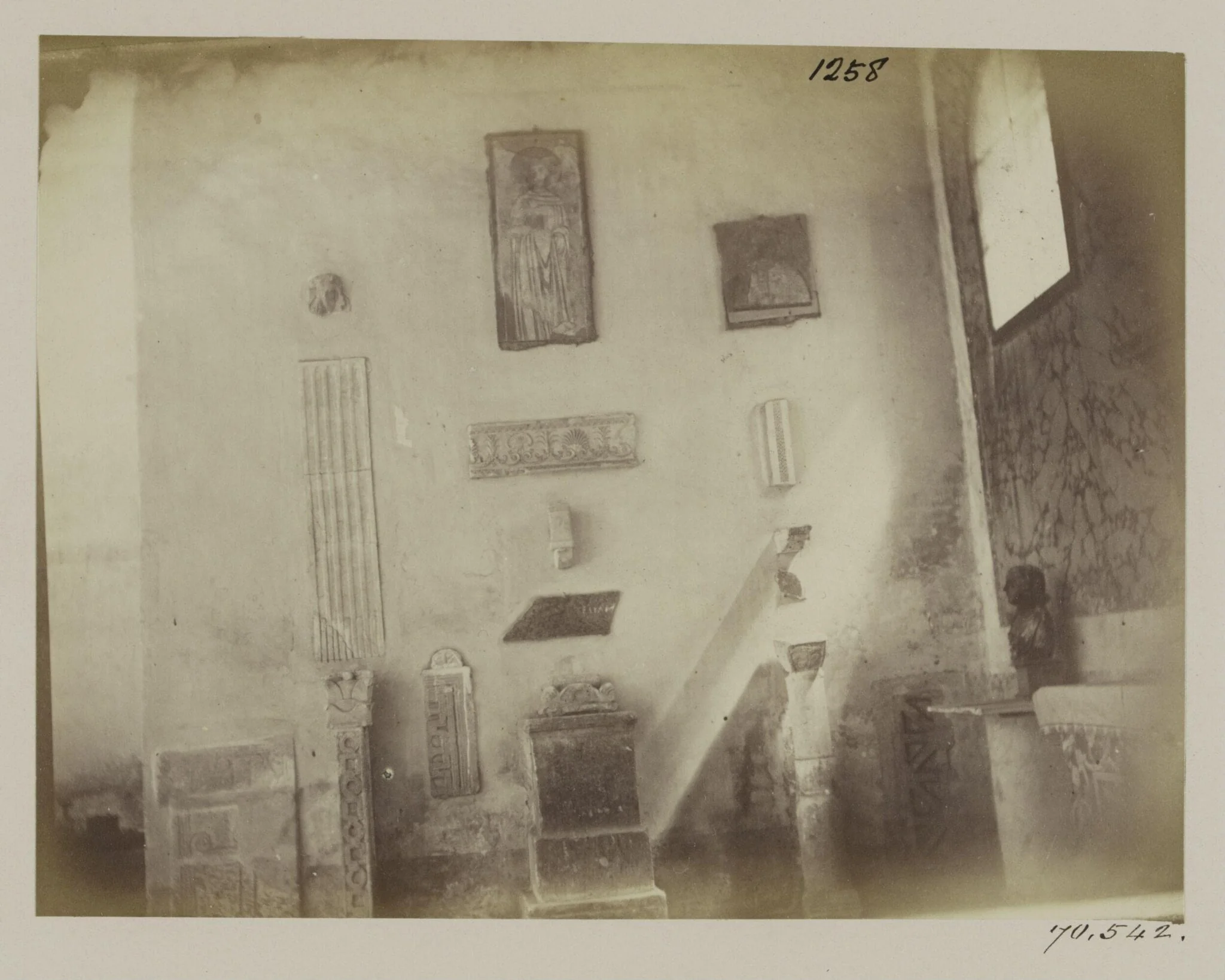 Church of S. Giorgio in Velabro - Fragments of marble sculpture, Tombs, &c., from the old Church, built into the wall.