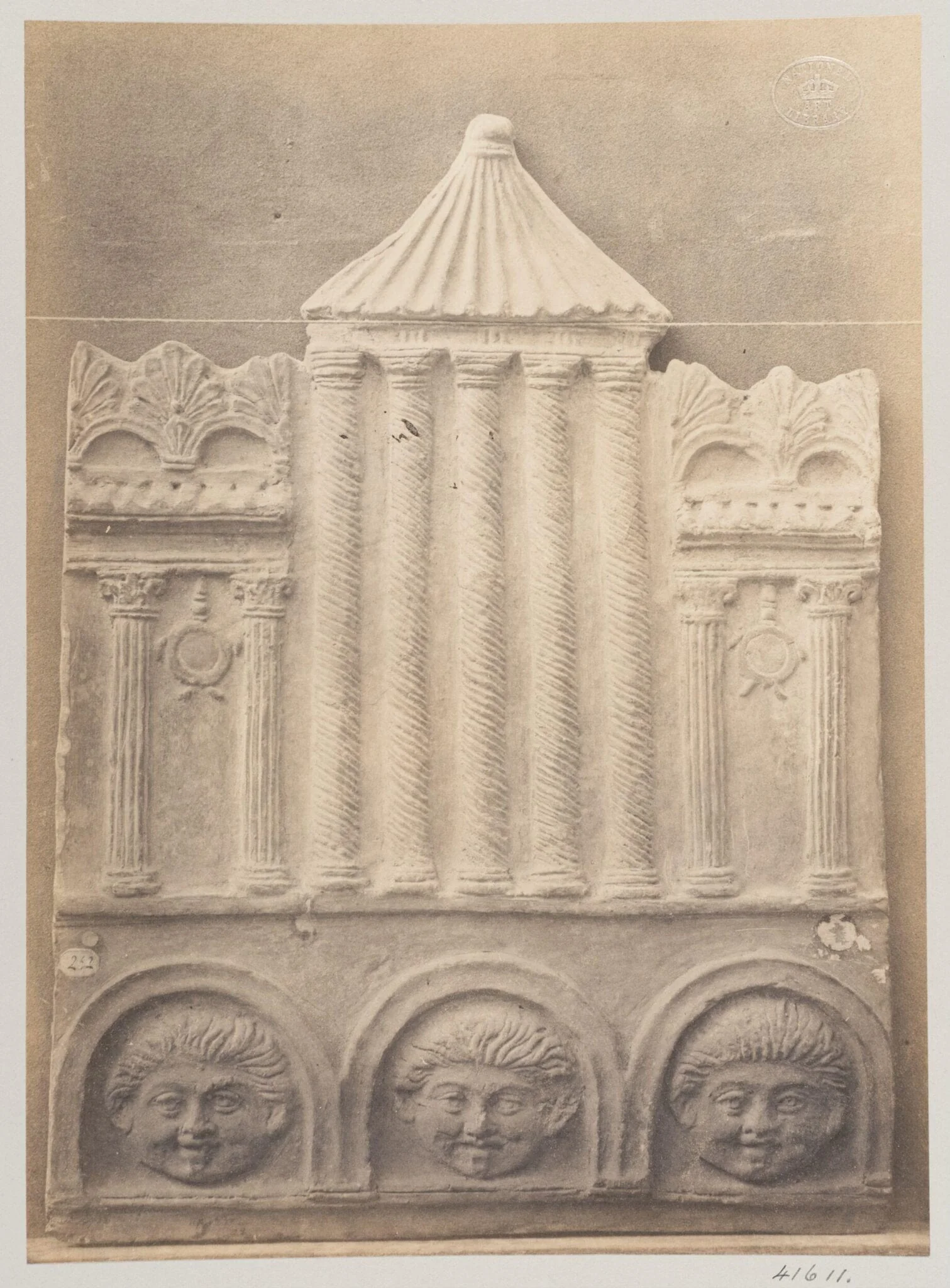 Bas-relief of temple in terra cotta