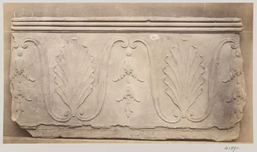 Bas-relief of a portion of a frieze depicting a palmetto and foliage in terra cotta