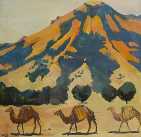 Mountain and passing camels