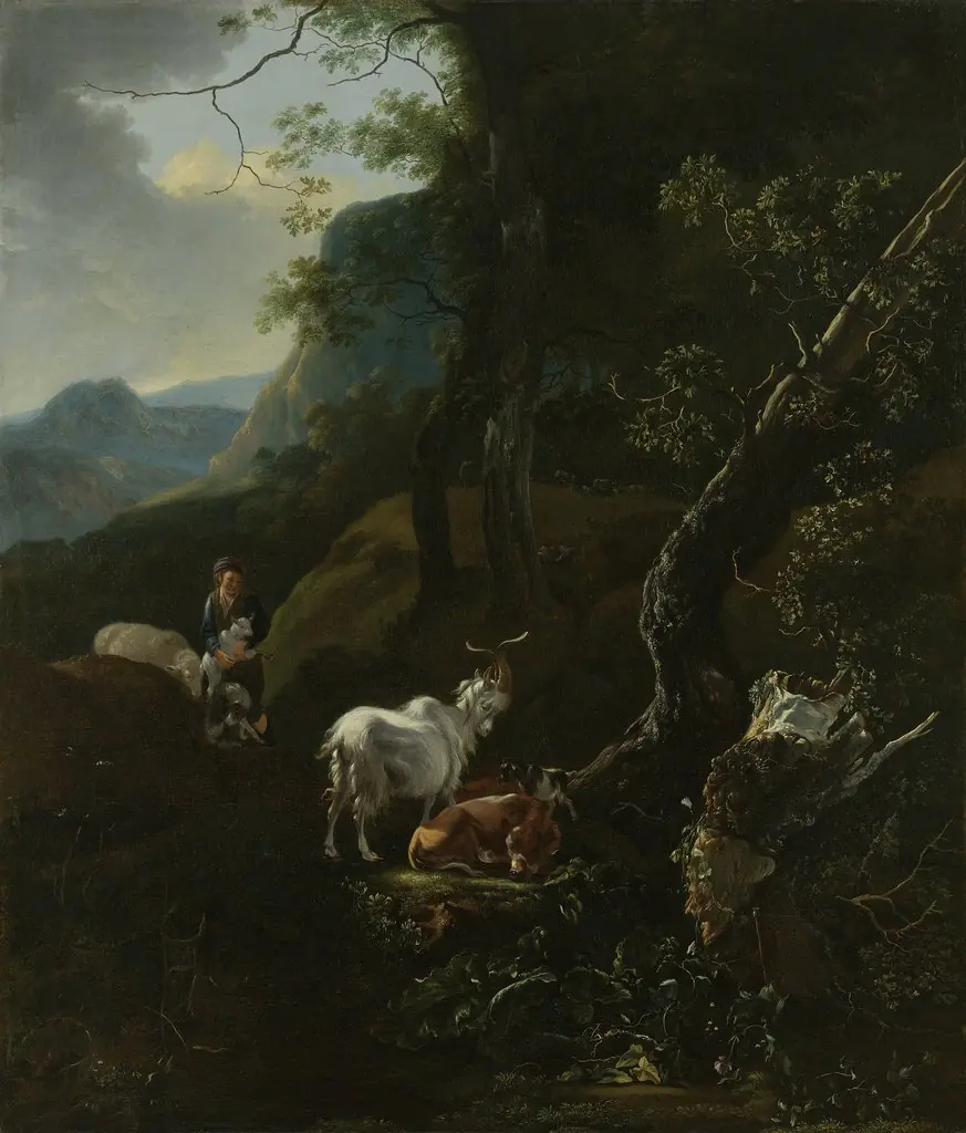 A sheperdess with her flock in a mountainous landscape