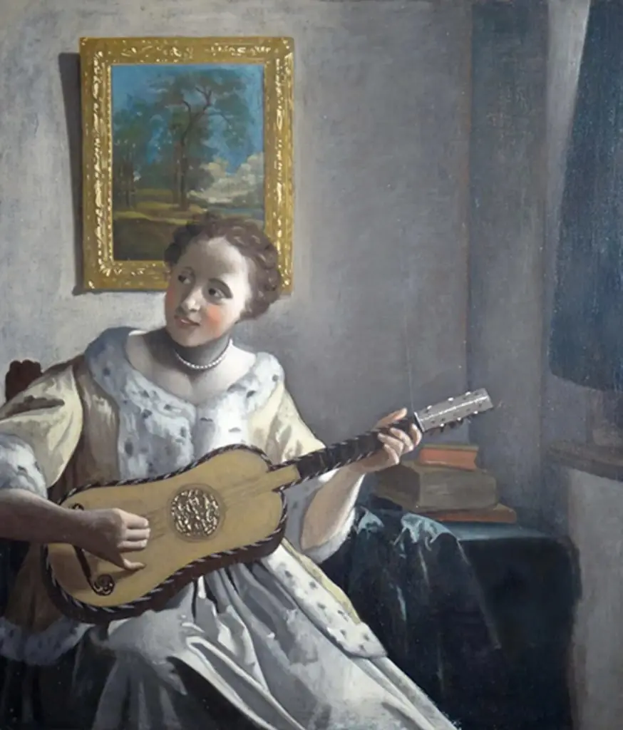 A Lady Playing the Guitar