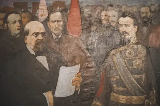 Lucrare având în planul apropiat pe domnitorul Al. I.Cuza și M. Kogălniceanu aflați într-o încăpere. Prințul este în uniformă militară și ține în una din mâini un document rulat. Are în față o masă îmbrăcată în catifea verde. Kogălniceanu este îmbrăcat în costum negru, cămașă albă și legătură neagră la gât. Are în una din mâini, foile albe probabil ale Actului de inaugurare. În spate lor se află o mulțime de chipuri (din care se face remarcată figura Mitropolitului ) și două steaguri (roșu și alb - cel al Universității). Nu este semnat și nici datat.