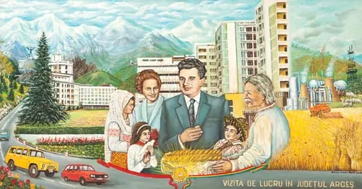 Tablou ”Vizită de lucru în Județul Argeș”, semnat artist amator Manda Vasile. În centru Nicolae și Elena Ceaușescu primind omagiul locuitorilor județului. Tabloul redă imaginea economiei argeșene în care se află fabrica de automobile ”Dacia” de la Colibașu și cea de autoturisme ”ARO” de la Câmpulung. Oferit de Comitetul Județean de Partid Argeș (1982).