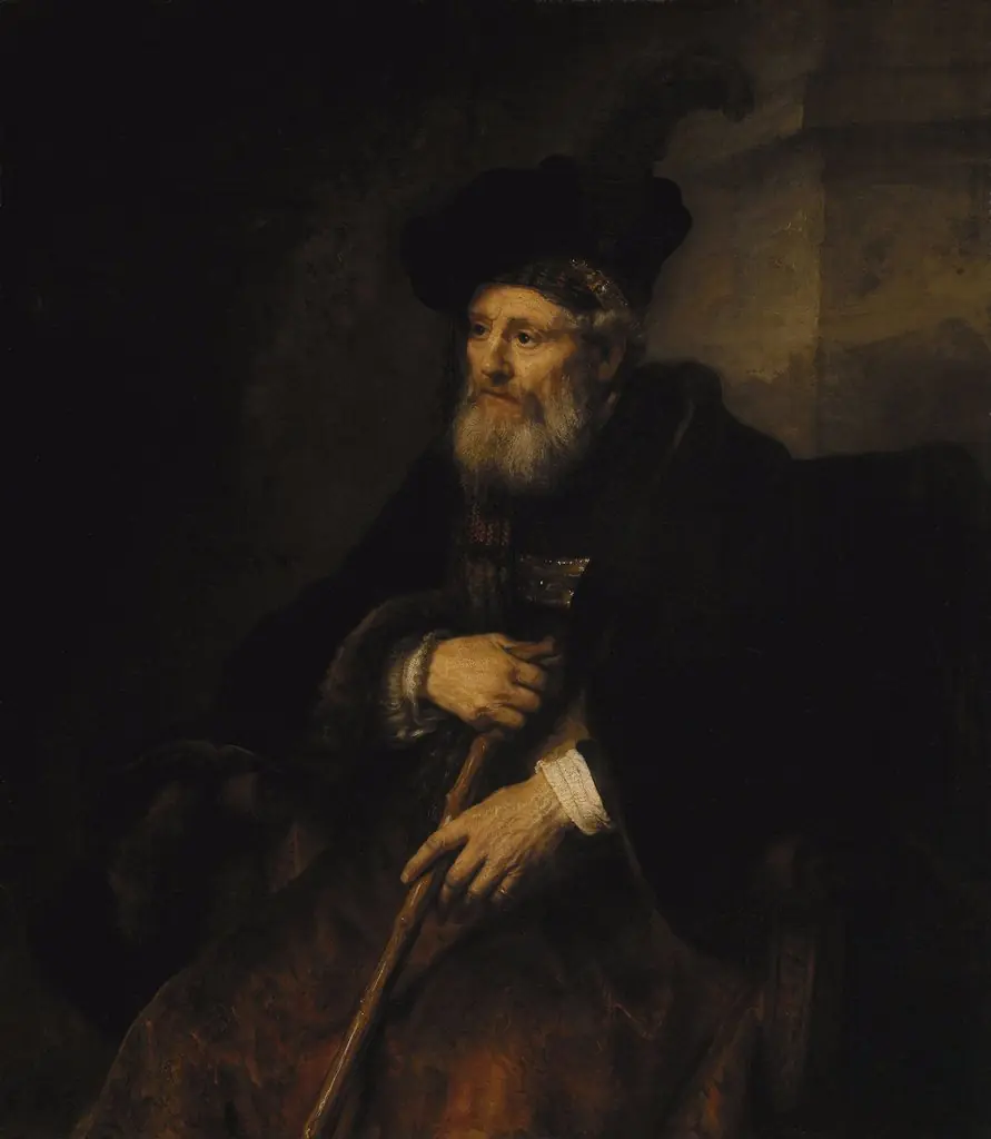 Seated old man with a cane in fanciful costume