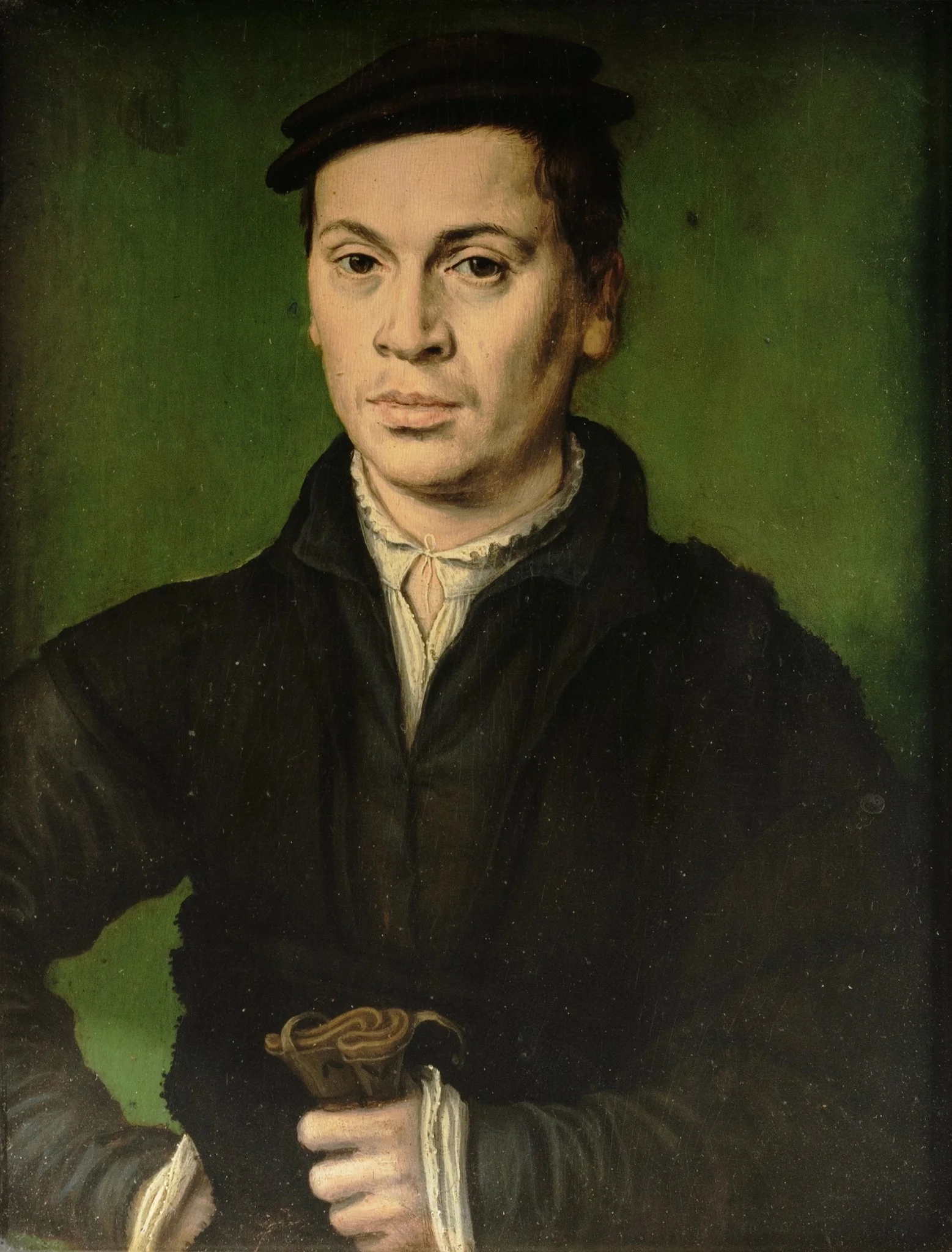 Man in black beret holding a pair of gloves, by Corneille de Lyon, oil, 1530