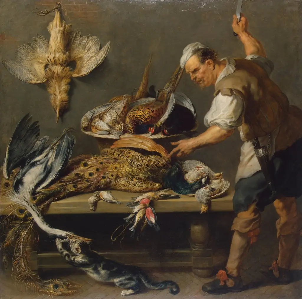 Cook at a Kitchen Table with Dead Game on it