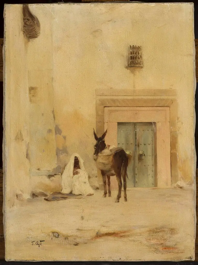 Arab and a donkey at the wall of a house