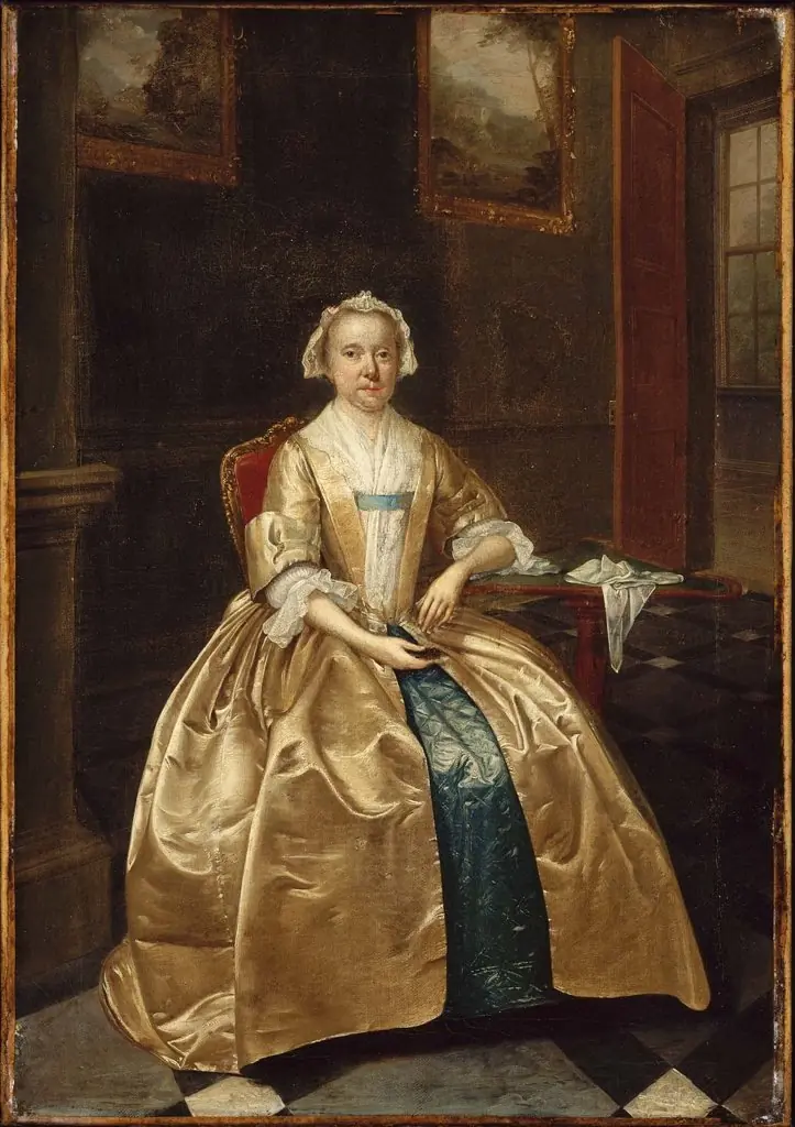 Portrait of a Woman Seated beside a Table