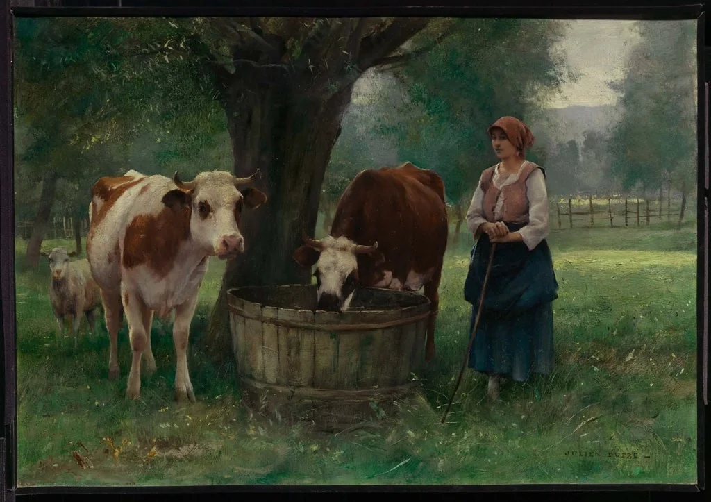 Young Woman Watering Cattle