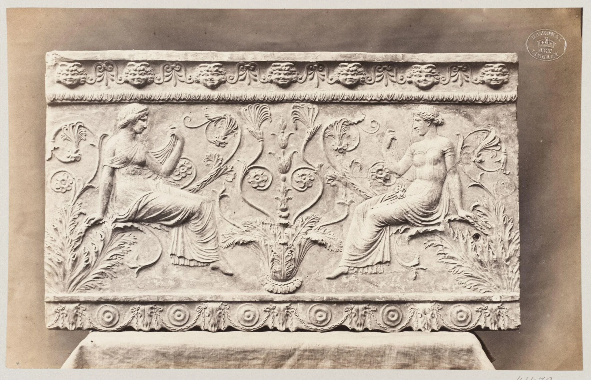 Two female figures seated on foliage ornament, bas-relief in terra cotta, by Louise Laffon, photographic, 1864
