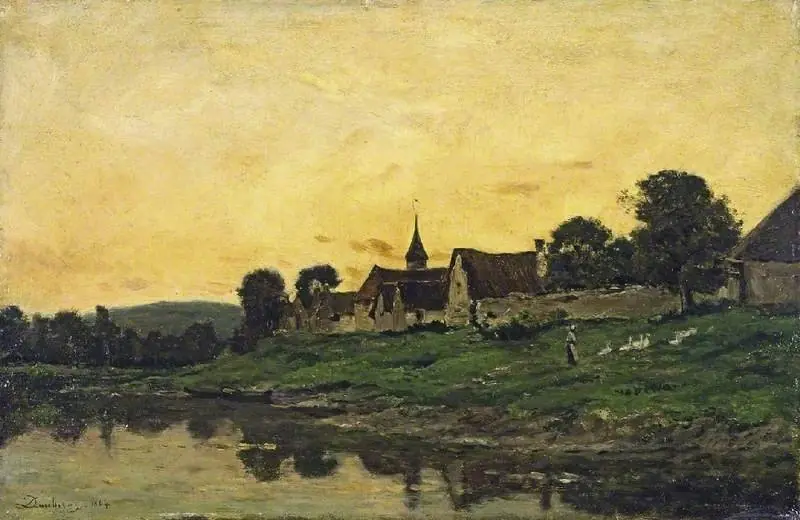 Village on a river, sunset