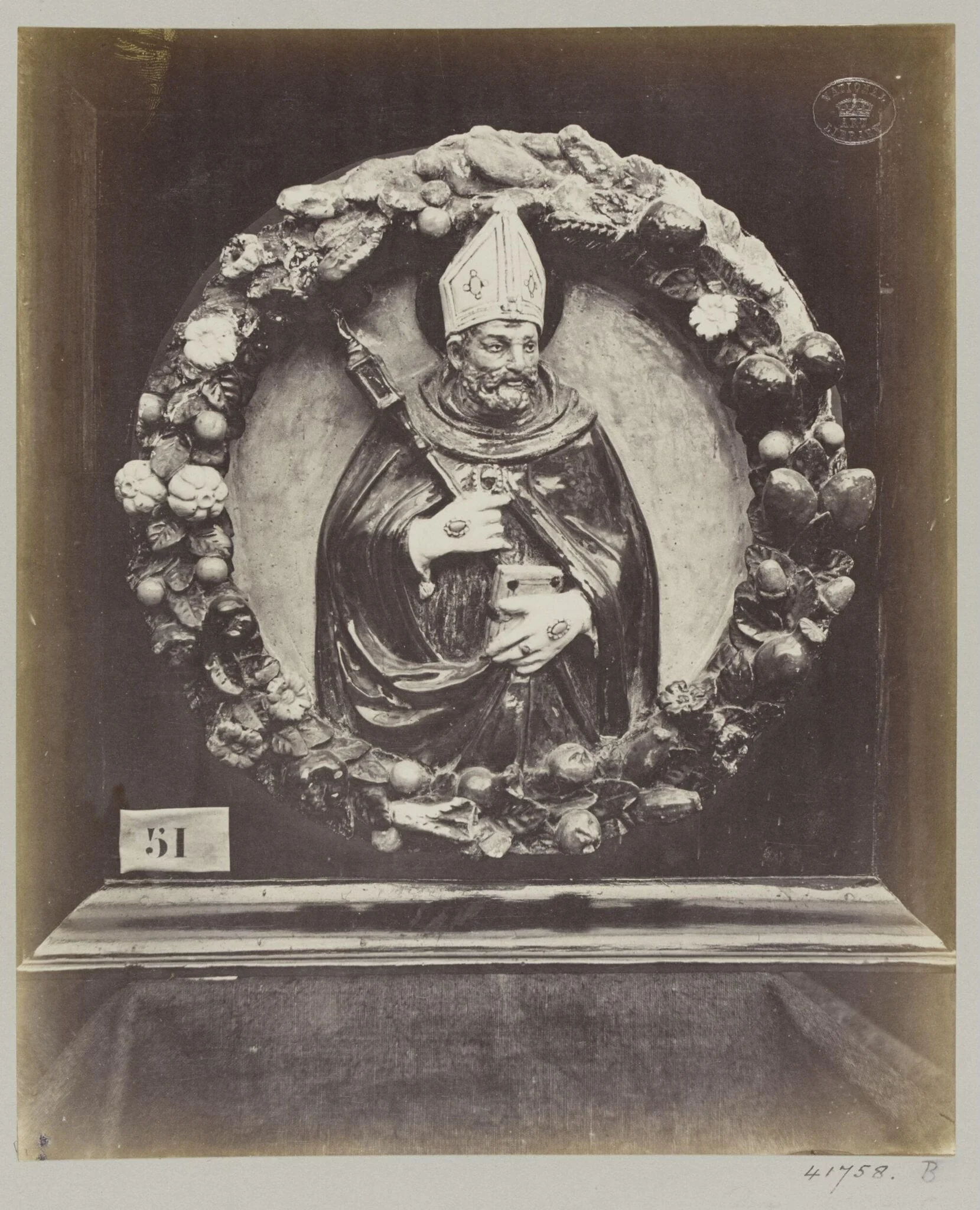 Enamelled earthenware bas-relief medallion of Saint Augustin