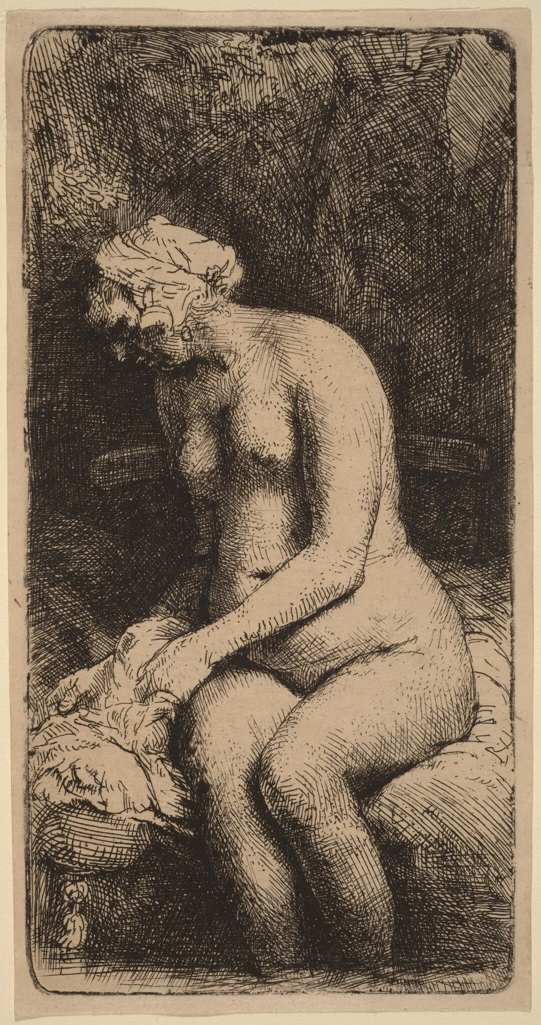 Nude Seated on a Bench with a Pillow (Woman Bathing Her Feet at a Brook), by Rembrandt, ink, 1658