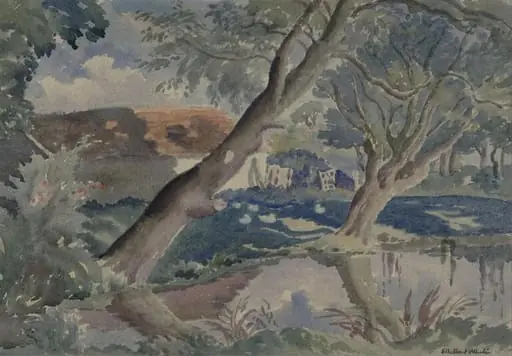 A pond  overshadowed by two trees; buildings in the  background