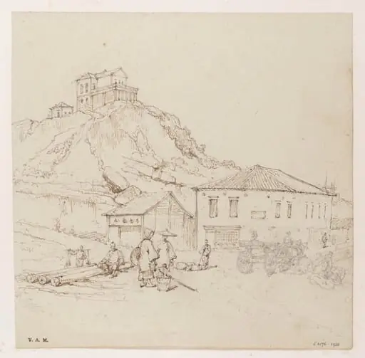 A steep hill in Macau, with buildings below it and on its summit