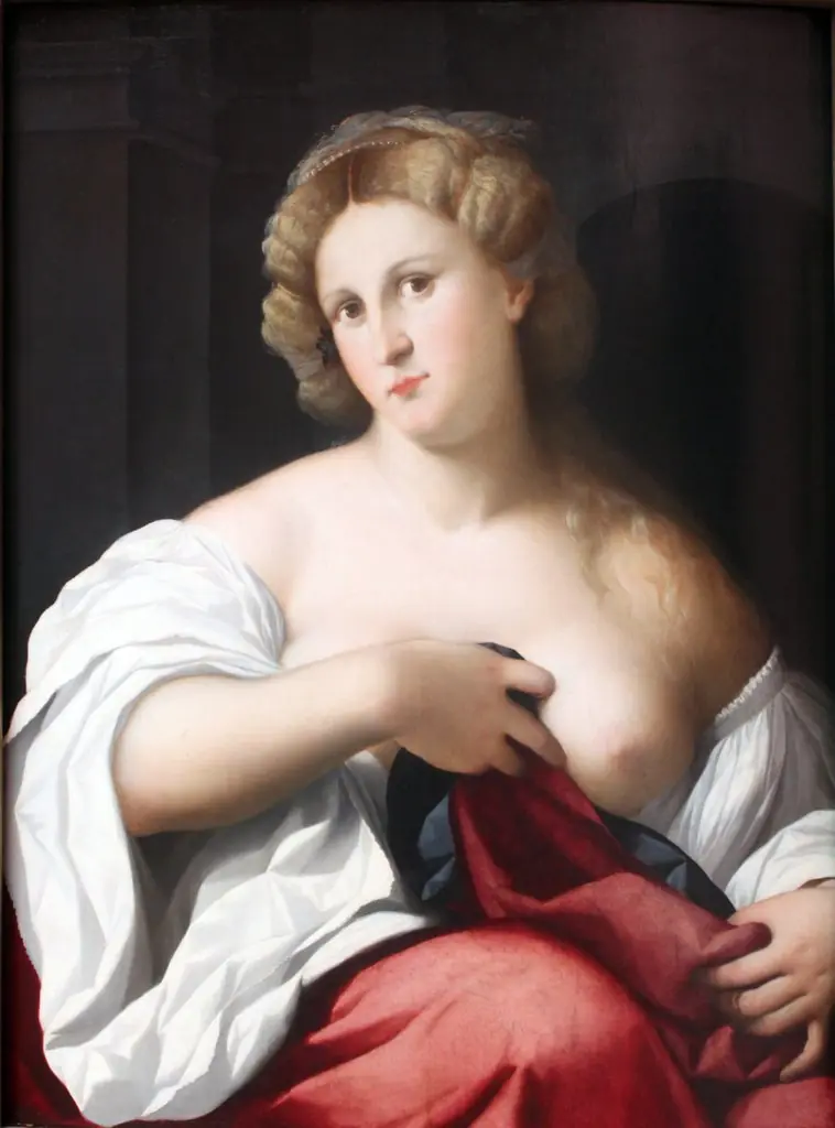 Portrait of a young woman with bare chest