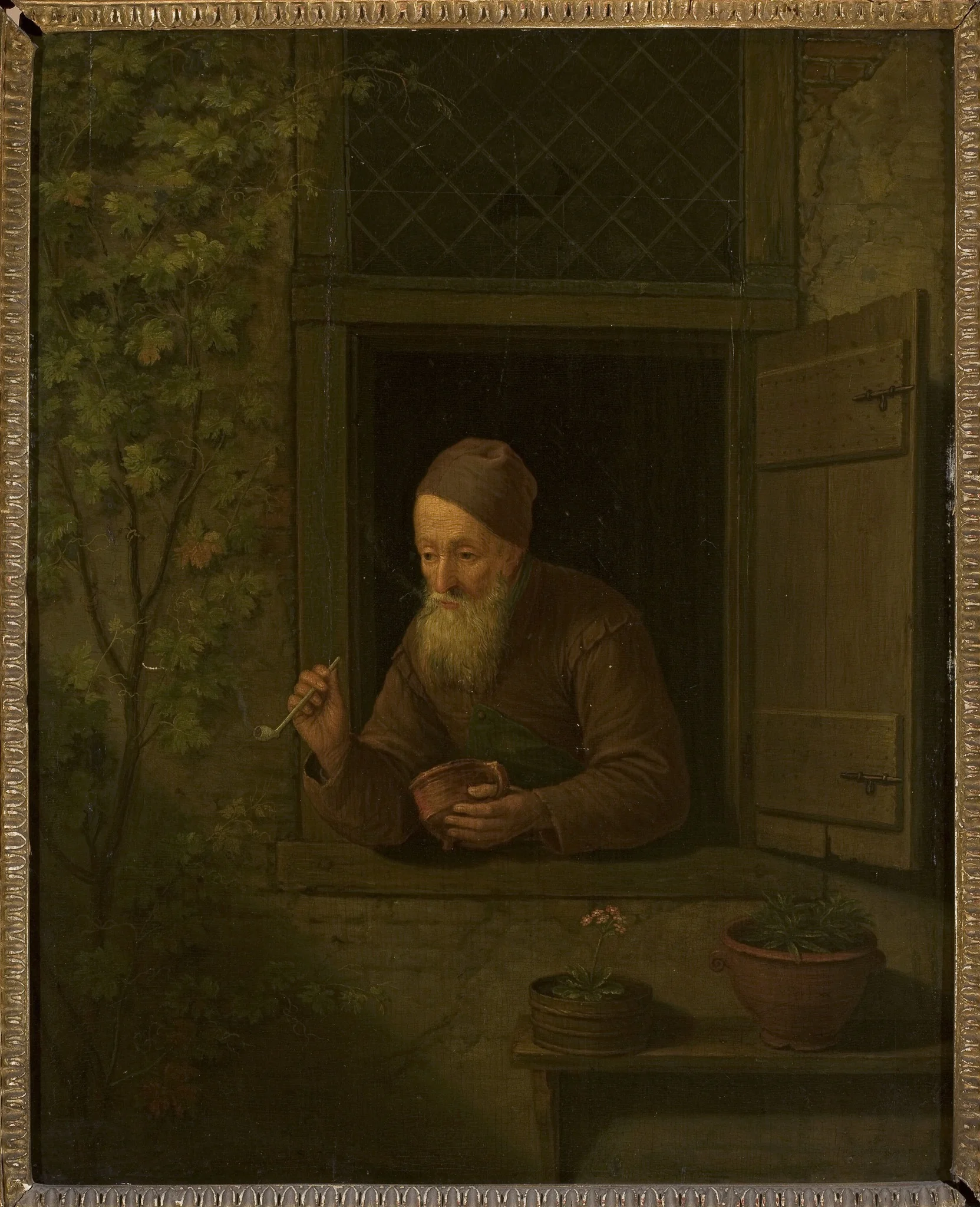Old man with a pipe in the window