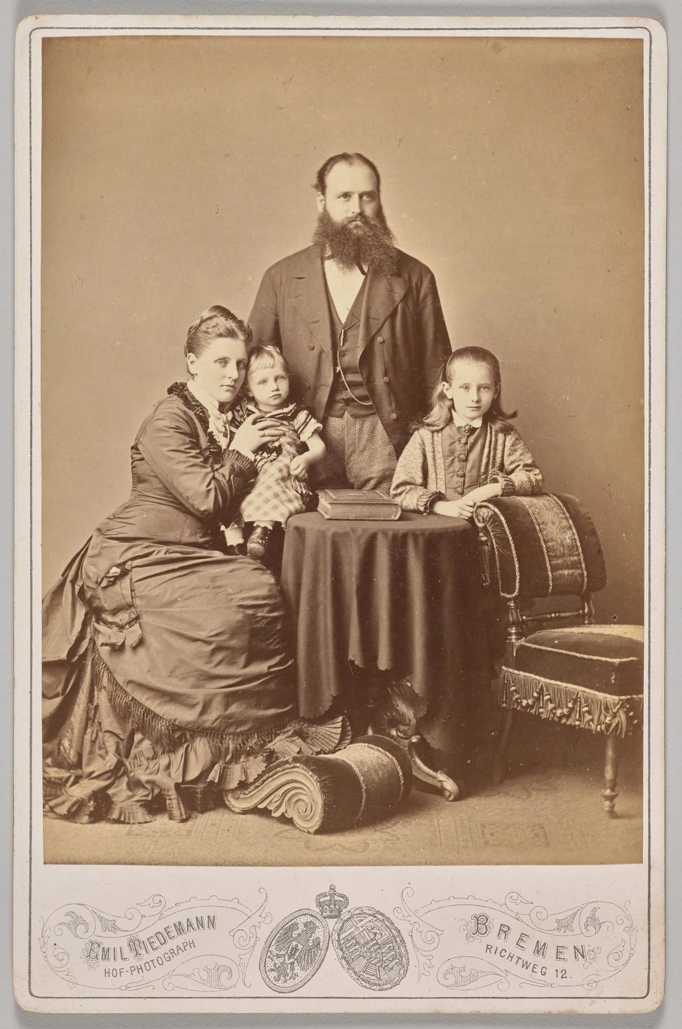 Untitled (studio portrait of a family), by Emil Tiedemann, 1874
