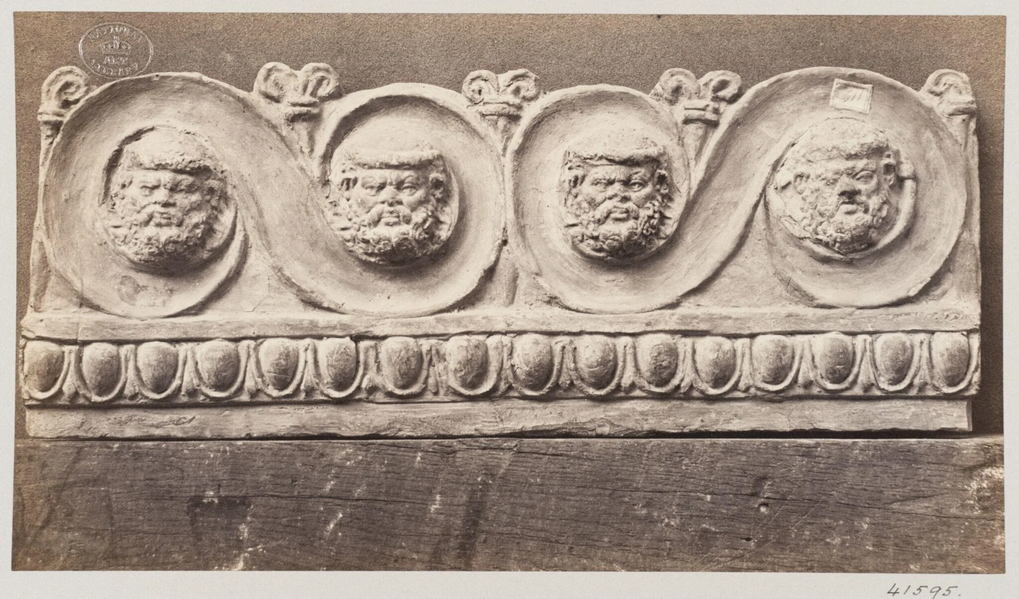 Bas-relief scroll with four masques in terra cotta, by Louise Laffon, photographic, 1864
