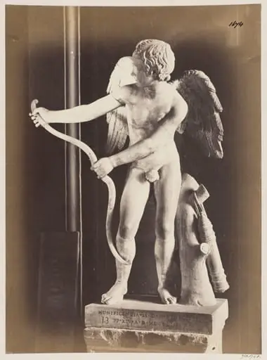 Sculpture - Statue of Cupid with his bow, in the Capitoline Museum.
