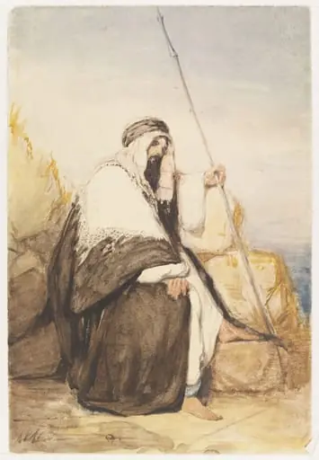 Figure of a Man in Arab dress, seated, holding a spear