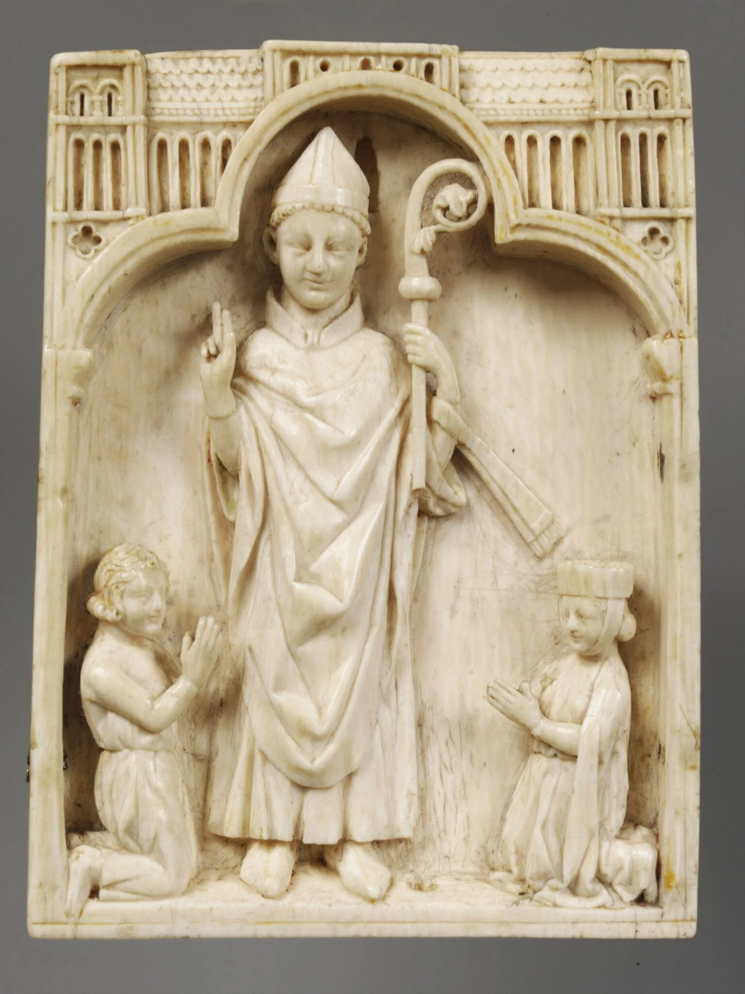 A bishop between donors, by Unknown, 1250