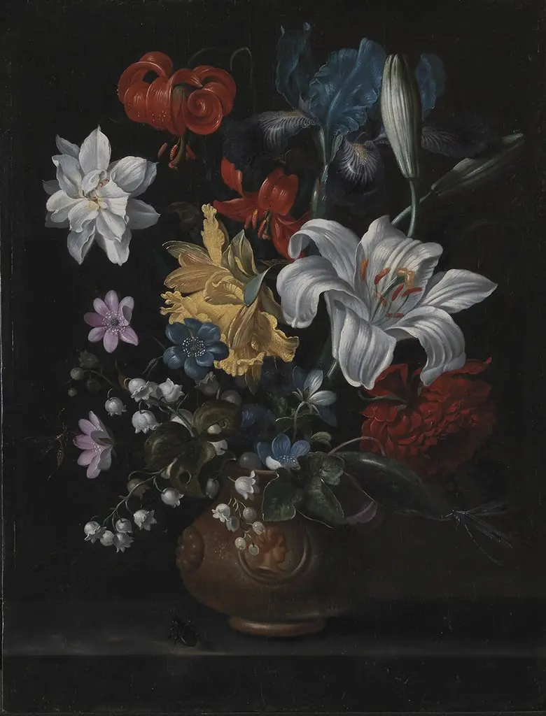 En stentøjskrukke med blomster