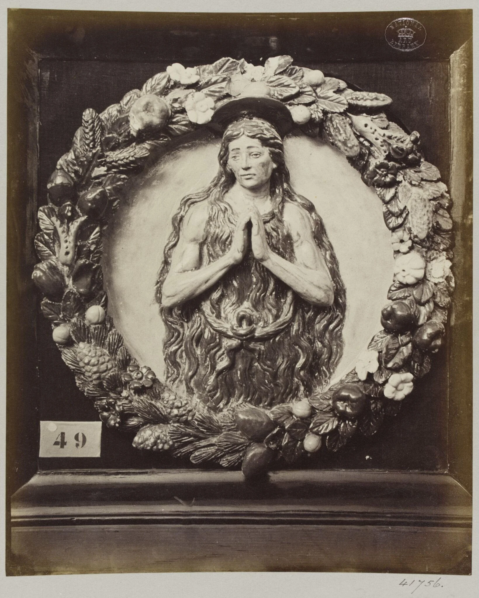 Enamelled earthenware bas-relief medallion of Saint Onofrio