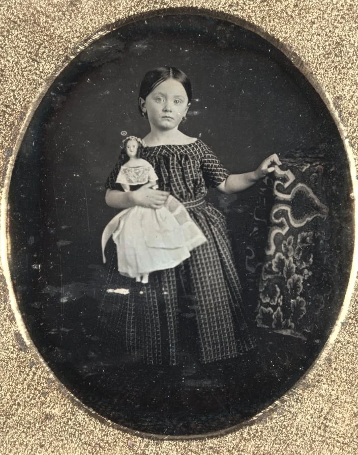 Girl with Doll