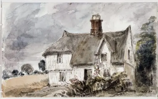 A cottage near a cornfield
