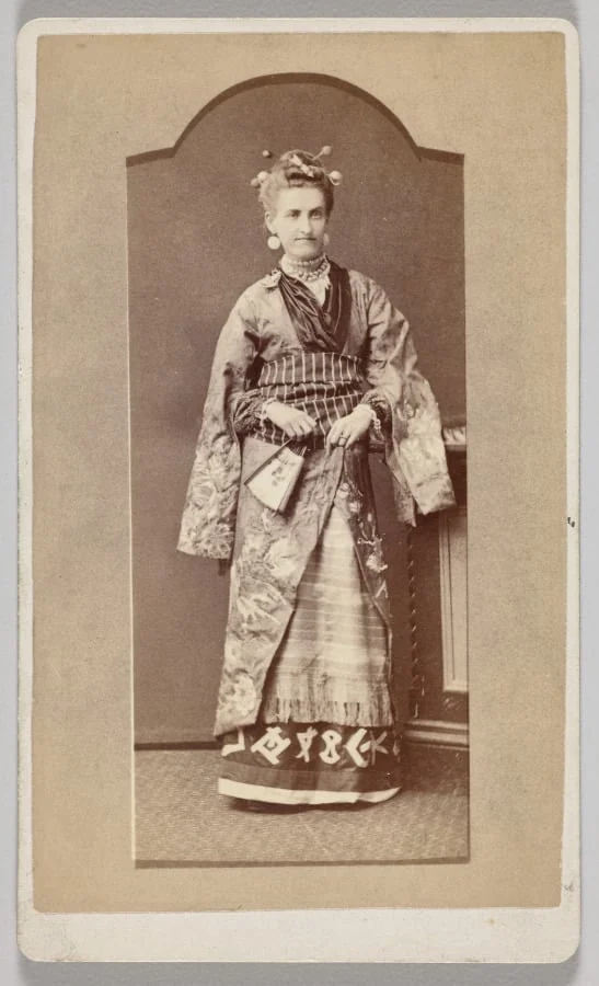 Untitled (white woman in Japanese kimono with fan), by Unknown, 1894