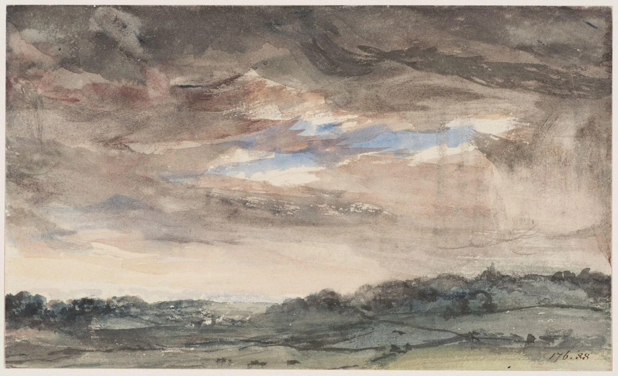 View over hilly country, with a stormy sky