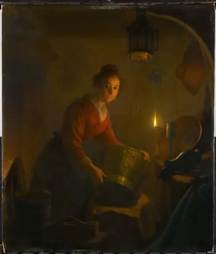 A Woman in a Kitchen by Candlelight