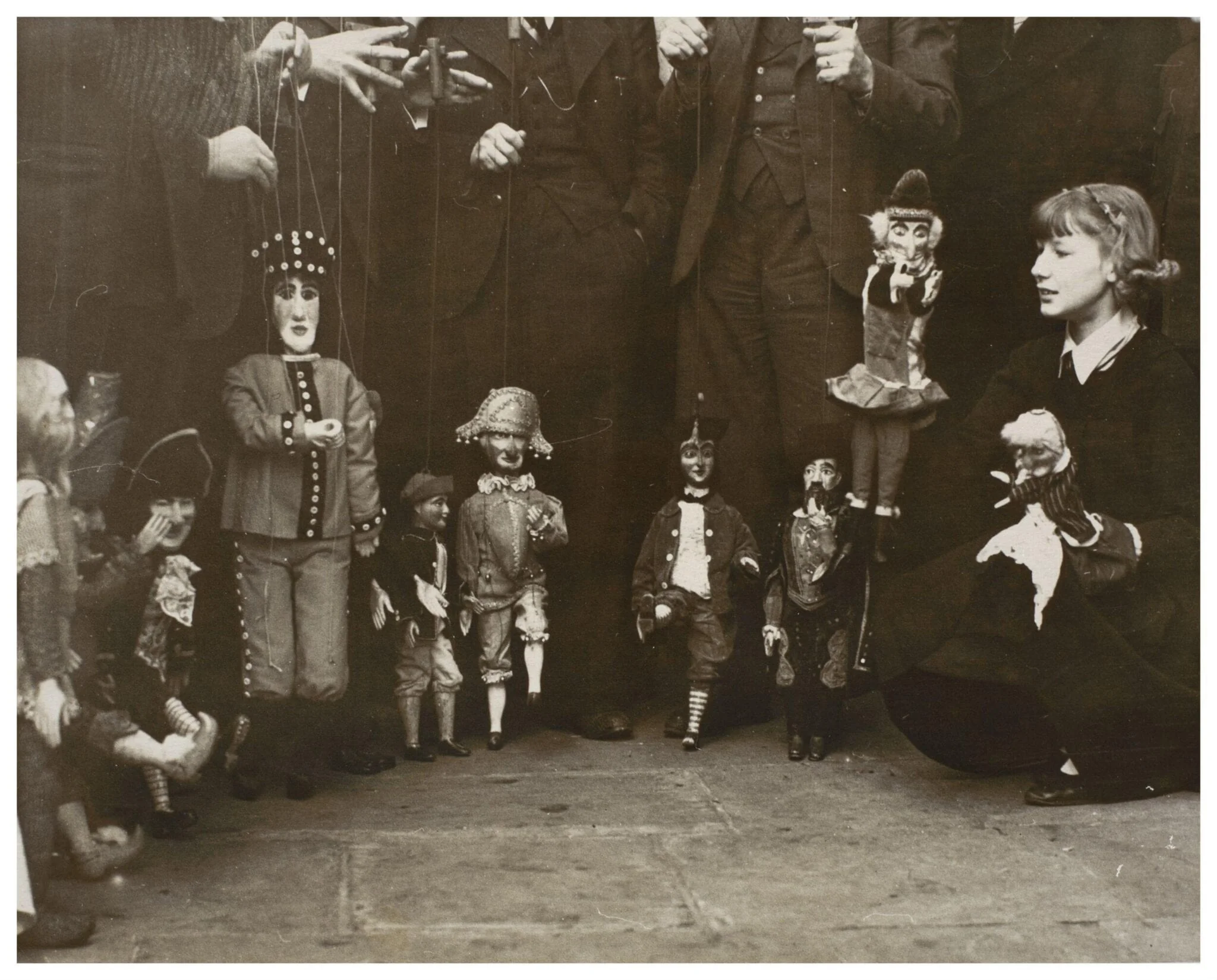 Photograph of puppeteers at the opening of the 13th Exhibition of the British Puppet and Model Theatre Guild, 1938, by Sport & General Press Agency Ltd, photographic, 1938