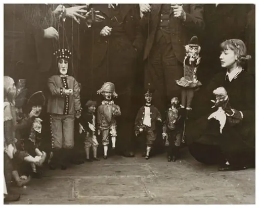 Photograph of puppeteers at the opening of the 13th Exhibition of the British Puppet and Model Theatre Guild, 1938