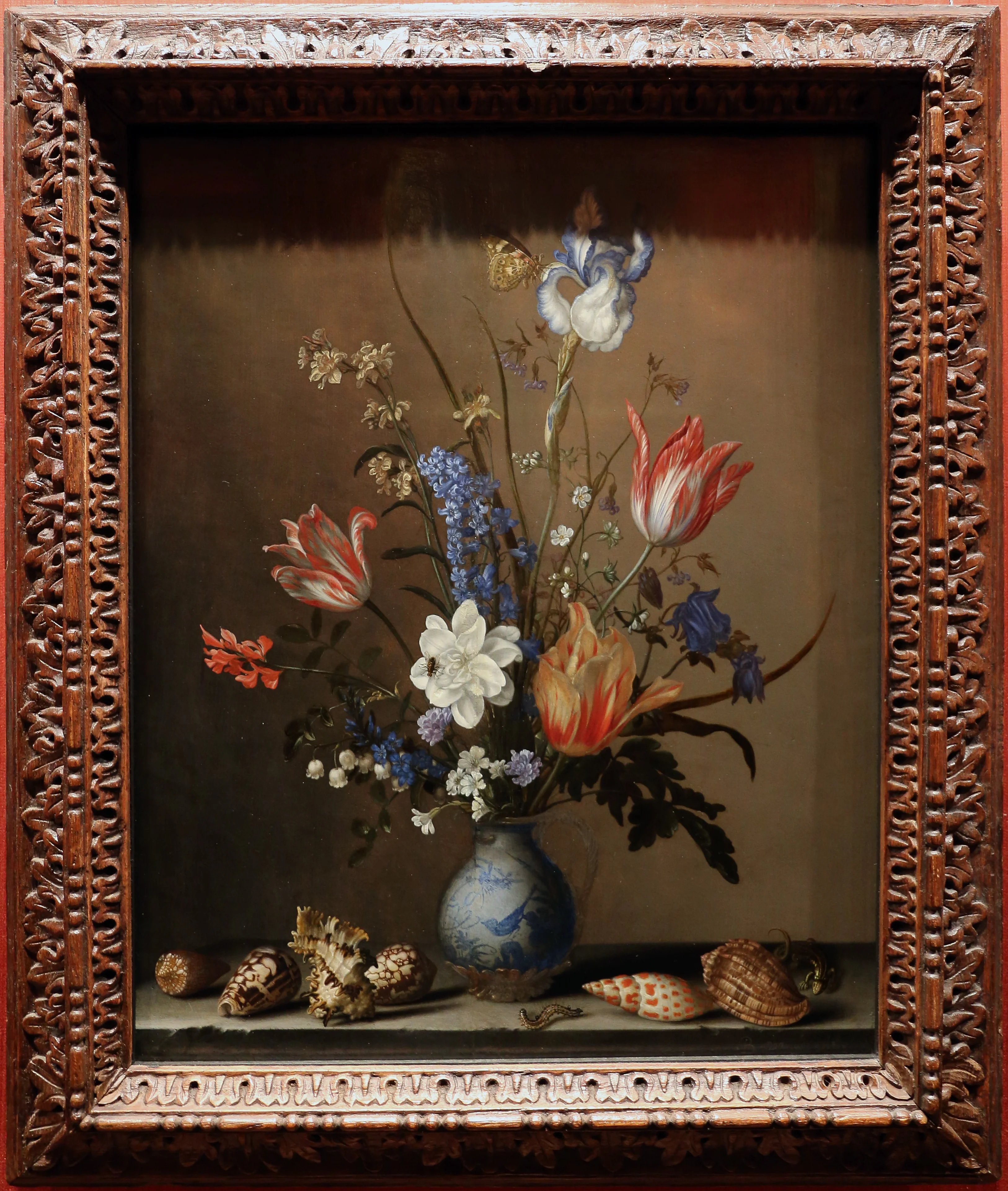 flowers in a wan-li vase, with shells