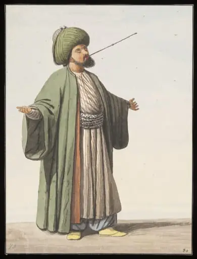 A Rufai dervish swallowing a red-hot skewer