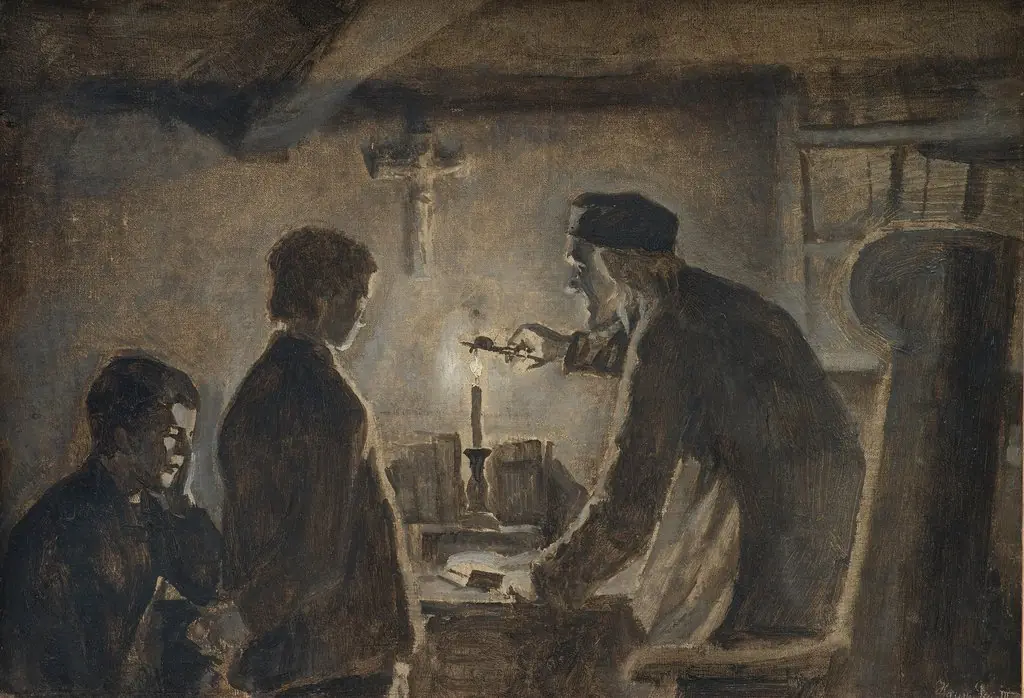 Pastor Sören blows out the candle on the New Year's Eve