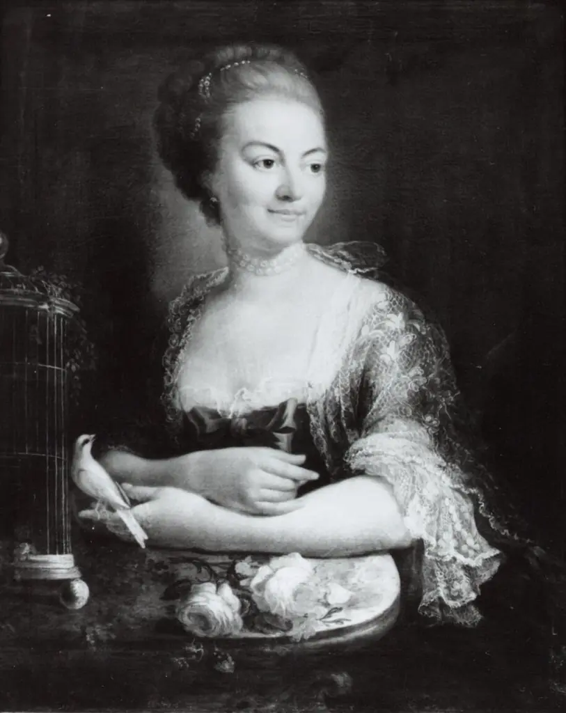 Een vrouw met een vogelkooi, zogenaamd portret van Susanna van Collen (1692-1745), sedert 1727 echtgenote van Jacob Feitama